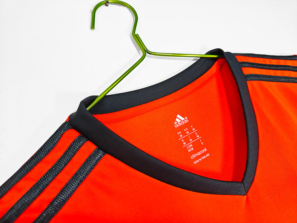 Real Madrid 2013/14 Segunda Visitante Naranja